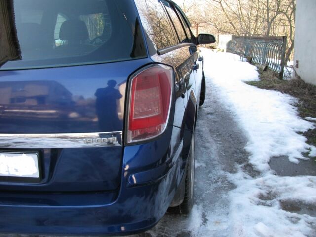 Синий Опель Астра, объемом двигателя 1.9 л и пробегом 242 тыс. км за 5655 $, фото 5 на Automoto.ua