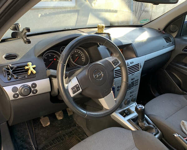 Синий Опель Астра, объемом двигателя 1.7 л и пробегом 216 тыс. км за 5500 $, фото 6 на Automoto.ua