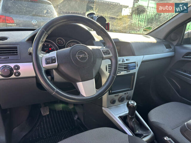 Синий Опель Астра, объемом двигателя 1.8 л и пробегом 209 тыс. км за 5800 $, фото 18 на Automoto.ua