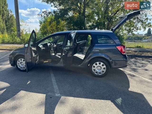 Синий Опель Астра, объемом двигателя 1.6 л и пробегом 198 тыс. км за 5700 $, фото 66 на Automoto.ua