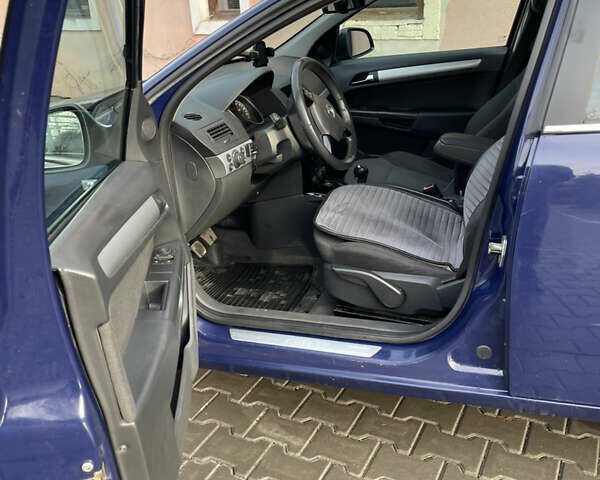 Синий Опель Астра, объемом двигателя 1.69 л и пробегом 328 тыс. км за 4500 $, фото 7 на Automoto.ua