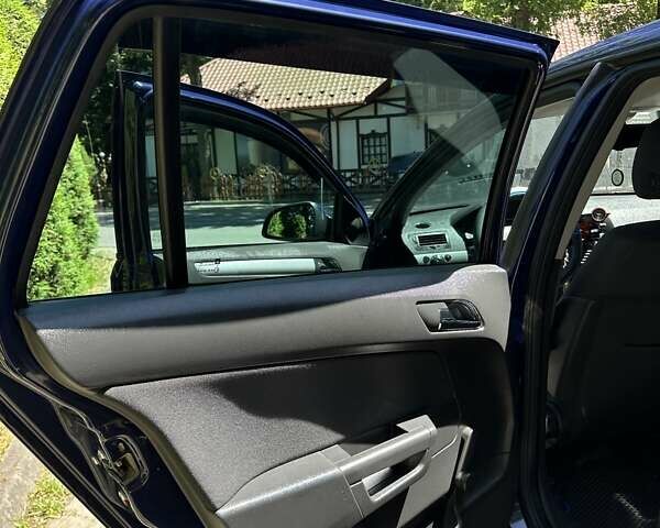 Синий Опель Астра, объемом двигателя 1.69 л и пробегом 270 тыс. км за 7200 $, фото 14 на Automoto.ua