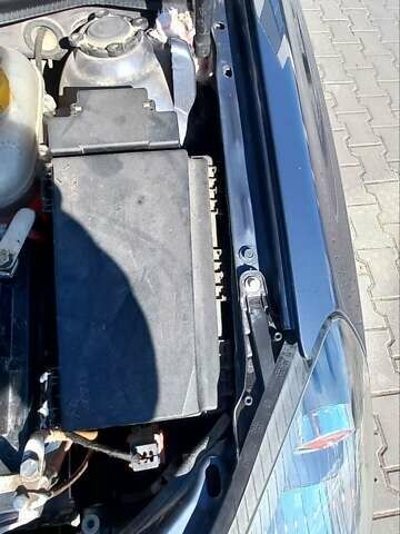 Синий Опель Астра, объемом двигателя 1.36 л и пробегом 214 тыс. км за 5900 $, фото 10 на Automoto.ua