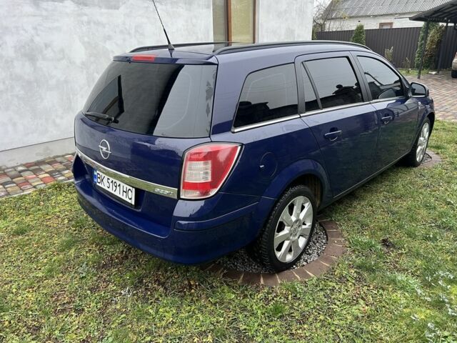Синий Опель Астра, объемом двигателя 1.7 л и пробегом 292 тыс. км за 5300 $, фото 3 на Automoto.ua