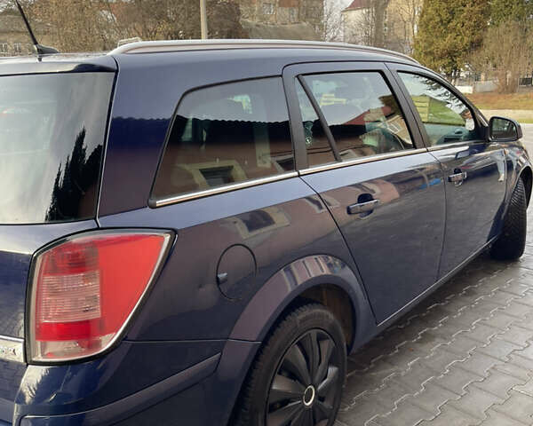 Синий Опель Астра, объемом двигателя 1.69 л и пробегом 328 тыс. км за 4500 $, фото 4 на Automoto.ua