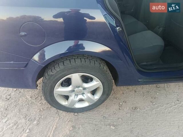 Синий Опель Астра, объемом двигателя 1.7 л и пробегом 251 тыс. км за 6100 $, фото 3 на Automoto.ua