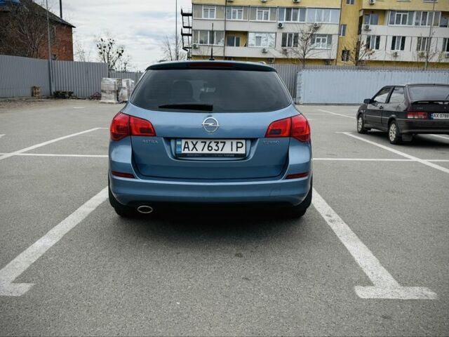 Синий Опель Астра, объемом двигателя 1.4 л и пробегом 225 тыс. км за 5300 $, фото 3 на Automoto.ua