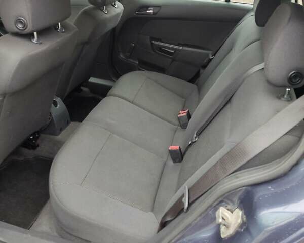 Синий Опель Астра, объемом двигателя 1.6 л и пробегом 230 тыс. км за 5650 $, фото 16 на Automoto.ua