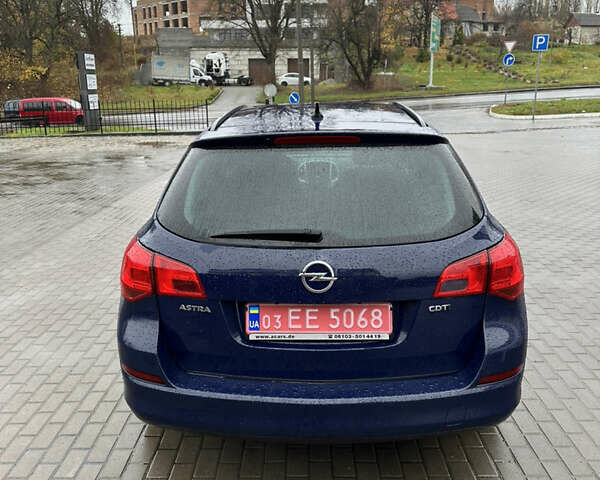 Синий Опель Астра, объемом двигателя 1.7 л и пробегом 211 тыс. км за 6400 $, фото 2 на Automoto.ua