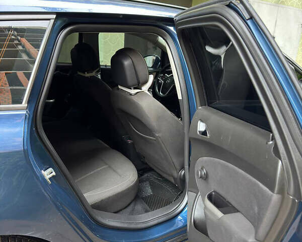 Синий Опель Астра, объемом двигателя 1.7 л и пробегом 231 тыс. км за 7000 $, фото 24 на Automoto.ua