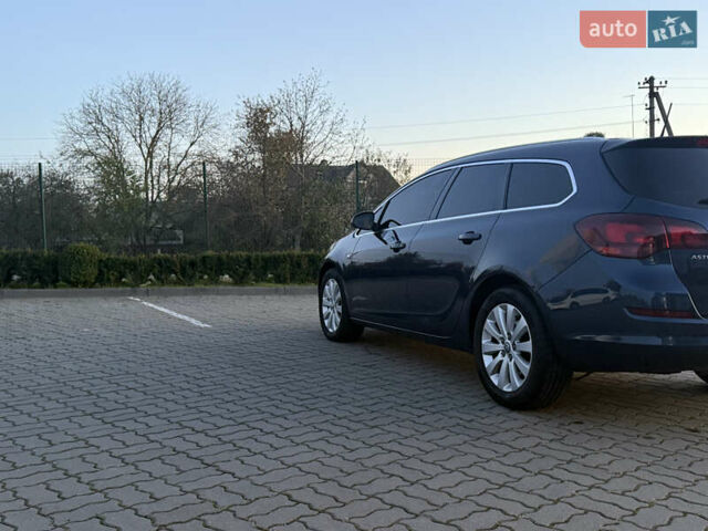 Синий Опель Астра, объемом двигателя 1.7 л и пробегом 171 тыс. км за 8700 $, фото 13 на Automoto.ua