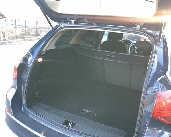 Синий Опель Астра, объемом двигателя 1.7 л и пробегом 219 тыс. км за 7500 $, фото 10 на Automoto.ua