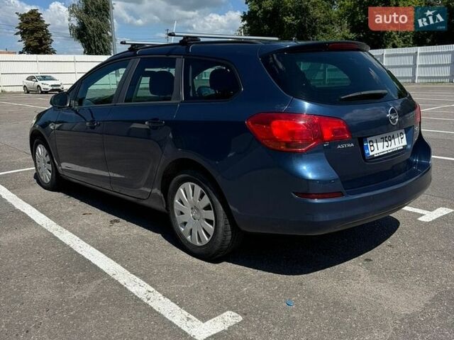 Синій Опель Астра, об'ємом двигуна 1.69 л та пробігом 260 тис. км за 5700 $, фото 5 на Automoto.ua