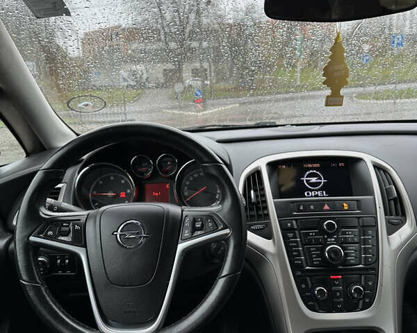 Синий Опель Астра, объемом двигателя 1.7 л и пробегом 211 тыс. км за 6400 $, фото 17 на Automoto.ua