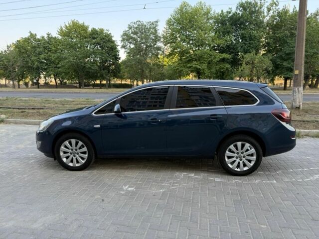 Синий Опель Астра, объемом двигателя 1.7 л и пробегом 194 тыс. км за 7900 $, фото 13 на Automoto.ua