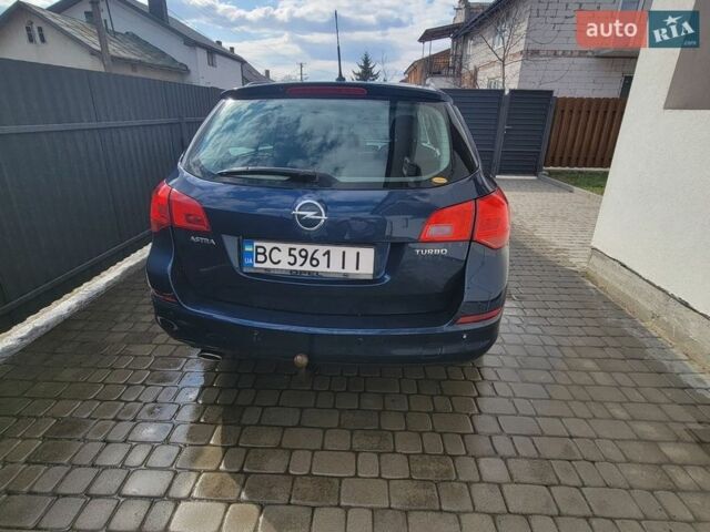 Синій Опель Астра, об'ємом двигуна 1.4 л та пробігом 160 тис. км за 5700 $, фото 4 на Automoto.ua
