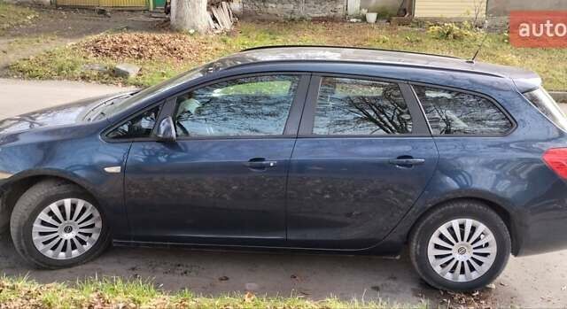 Синій Опель Астра, об'ємом двигуна 1.3 л та пробігом 270 тис. км за 6299 $, фото 4 на Automoto.ua