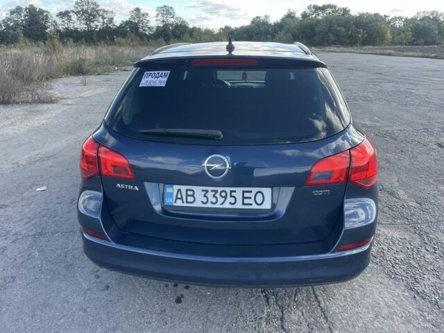 Синий Опель Астра, объемом двигателя 1.7 л и пробегом 220 тыс. км за 7200 $, фото 3 на Automoto.ua