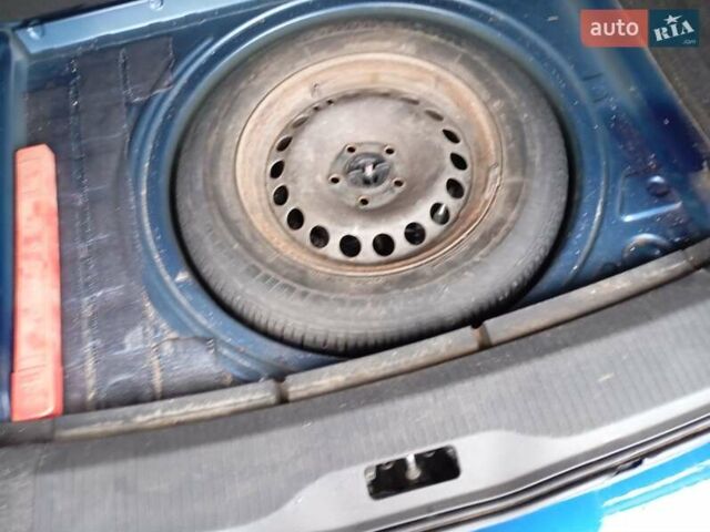 Синий Опель Астра, объемом двигателя 1.7 л и пробегом 245 тыс. км за 5550 $, фото 5 на Automoto.ua