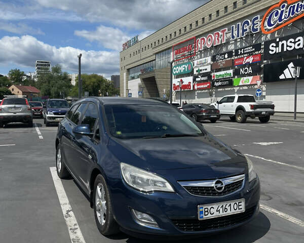 Синий Опель Астра, объемом двигателя 2 л и пробегом 326 тыс. км за 7299 $, фото 2 на Automoto.ua