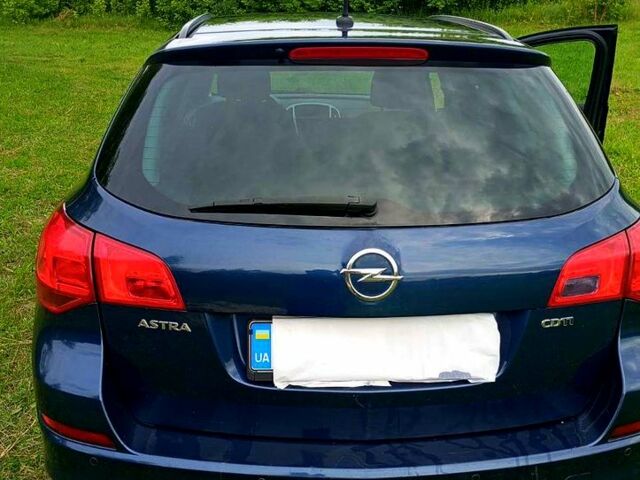 Синий Опель Астра, объемом двигателя 1.7 л и пробегом 200 тыс. км за 6800 $, фото 2 на Automoto.ua