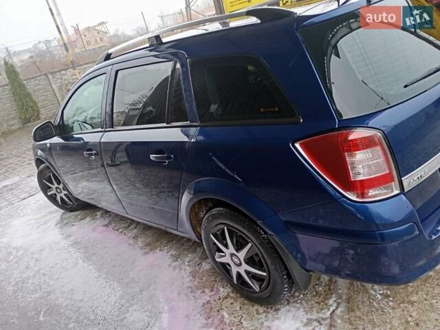 Синий Опель Астра, объемом двигателя 1.7 л и пробегом 245 тыс. км за 5550 $, фото 2 на Automoto.ua