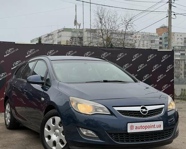 Синий Опель Астра, объемом двигателя 1.25 л и пробегом 214 тыс. км за 6500 $, фото 2 на Automoto.ua