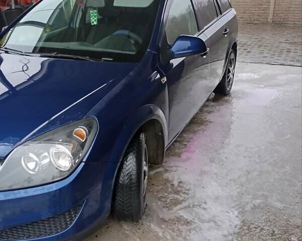 Синий Опель Астра, объемом двигателя 1.7 л и пробегом 245 тыс. км за 5550 $, фото 1 на Automoto.ua