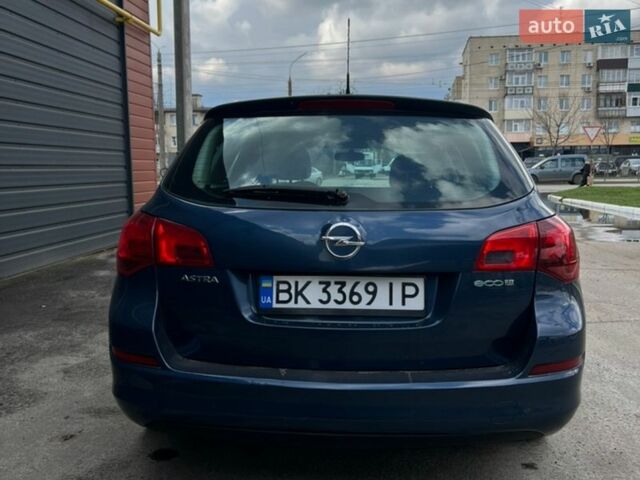 Синий Опель Астра, объемом двигателя 1.3 л и пробегом 215 тыс. км за 5950 $, фото 4 на Automoto.ua