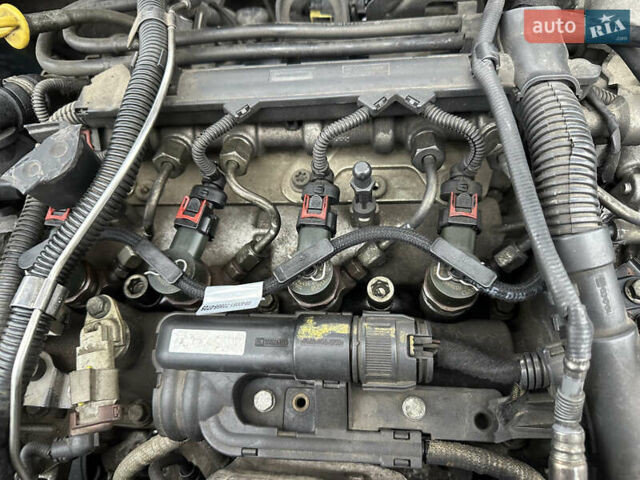 Синий Опель Астра, объемом двигателя 1.2 л и пробегом 308 тыс. км за 7000 $, фото 5 на Automoto.ua