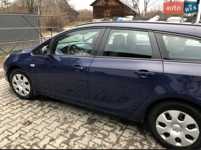 Синий Опель Астра, объемом двигателя 1.69 л и пробегом 320 тыс. км за 5600 $, фото 4 на Automoto.ua