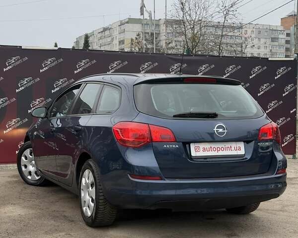 Синий Опель Астра, объемом двигателя 1.25 л и пробегом 214 тыс. км за 6500 $, фото 7 на Automoto.ua