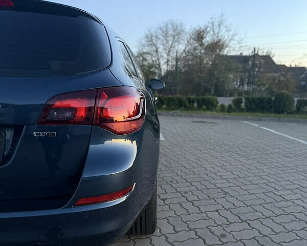 Синий Опель Астра, объемом двигателя 1.7 л и пробегом 171 тыс. км за 8700 $, фото 43 на Automoto.ua