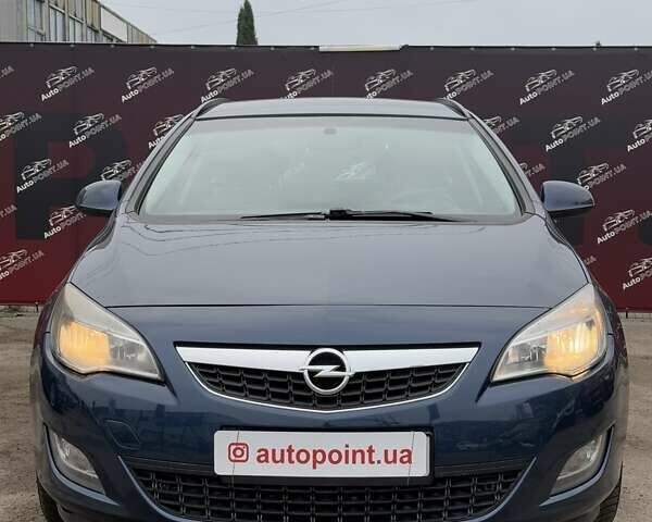 Синий Опель Астра, объемом двигателя 1.25 л и пробегом 214 тыс. км за 6500 $, фото 1 на Automoto.ua