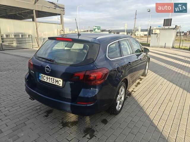 Синий Опель Астра, объемом двигателя 2 л и пробегом 280 тыс. км за 7300 $, фото 7 на Automoto.ua