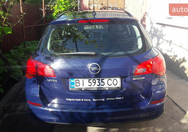 Синий Опель Астра, объемом двигателя 1.2 л и пробегом 203 тыс. км за 7500 $, фото 2 на Automoto.ua