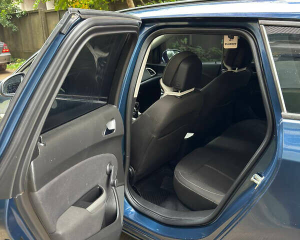 Синий Опель Астра, объемом двигателя 1.7 л и пробегом 231 тыс. км за 7000 $, фото 22 на Automoto.ua