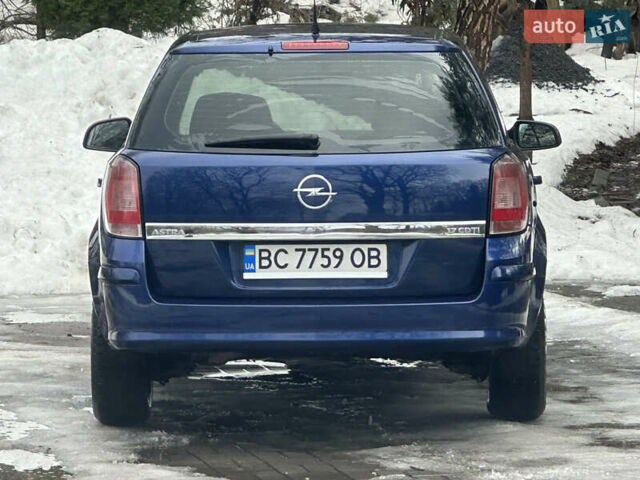 Синий Опель Астра, объемом двигателя 1.7 л и пробегом 261 тыс. км за 5499 $, фото 12 на Automoto.ua