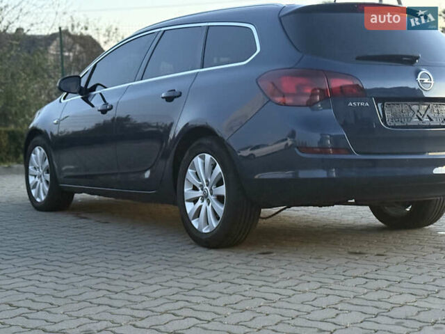 Синий Опель Астра, объемом двигателя 1.7 л и пробегом 171 тыс. км за 8700 $, фото 4 на Automoto.ua