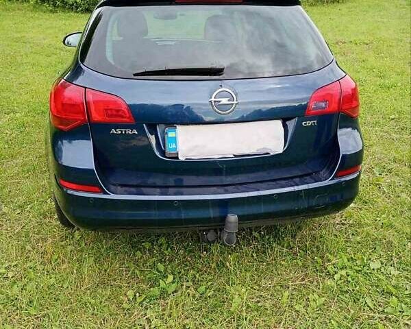 Синій Опель Астра, об'ємом двигуна 1.69 л та пробігом 200 тис. км за 7000 $, фото 2 на Automoto.ua