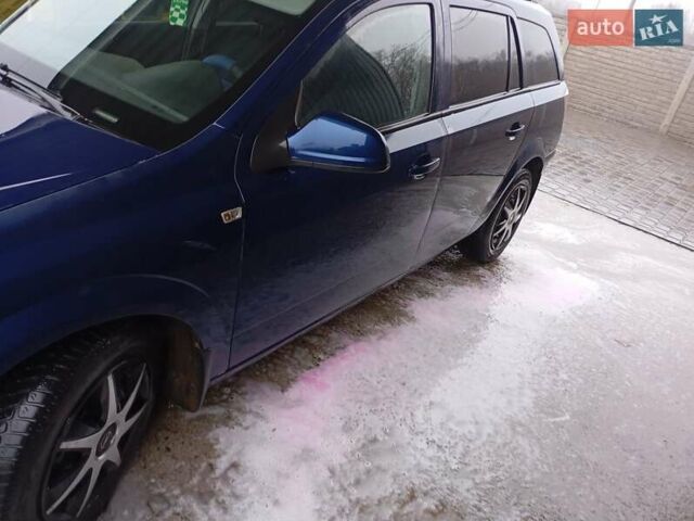 Синий Опель Астра, объемом двигателя 1.7 л и пробегом 245 тыс. км за 5550 $, фото 3 на Automoto.ua