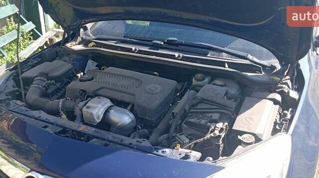 Синий Опель Астра, объемом двигателя 1.3 л и пробегом 248 тыс. км за 6600 $, фото 1 на Automoto.ua