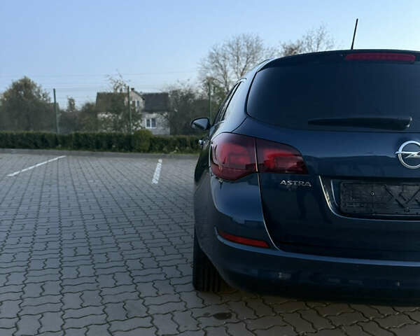 Синий Опель Астра, объемом двигателя 1.7 л и пробегом 171 тыс. км за 8700 $, фото 18 на Automoto.ua