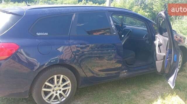 Синий Опель Астра, объемом двигателя 1.3 л и пробегом 248 тыс. км за 6600 $, фото 3 на Automoto.ua