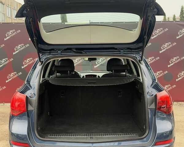 Синий Опель Астра, объемом двигателя 1.25 л и пробегом 214 тыс. км за 6500 $, фото 10 на Automoto.ua