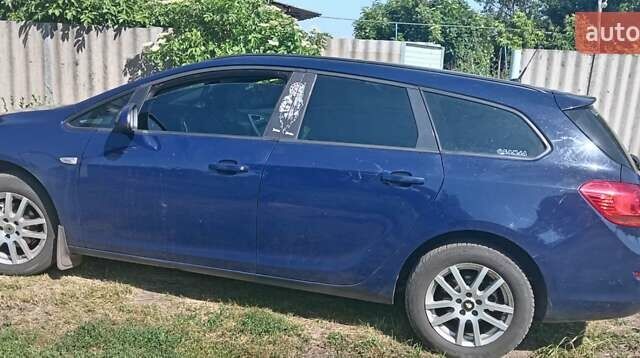 Синий Опель Астра, объемом двигателя 1.3 л и пробегом 248 тыс. км за 6600 $, фото 4 на Automoto.ua