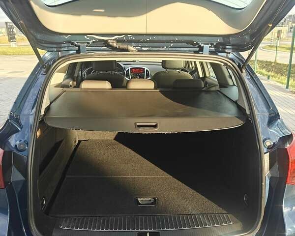 Синий Опель Астра, объемом двигателя 2 л и пробегом 280 тыс. км за 7300 $, фото 8 на Automoto.ua