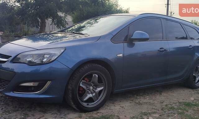 Опель Астра 2012 в Виннице на Automoto.ua Синий Опель Астра, объемом двигателя 1.3 л и пробегом 255 тыс. км за 6000 $, фото 5 на Automoto.ua