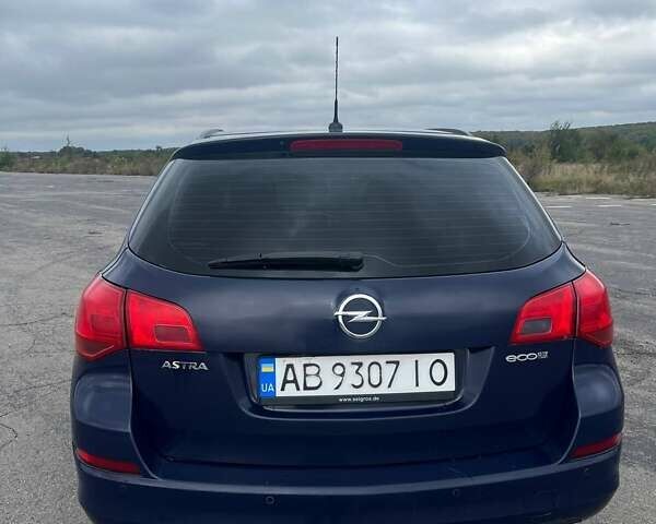 Синий Опель Астра, объемом двигателя 1.3 л и пробегом 246 тыс. км за 6500 $, фото 2 на Automoto.ua
