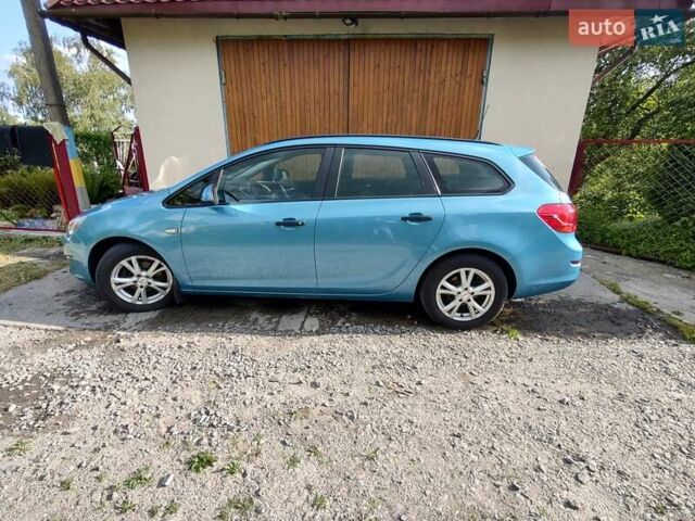 Синий Опель Астра, объемом двигателя 1.25 л и пробегом 225 тыс. км за 8700 $, фото 11 на Automoto.ua